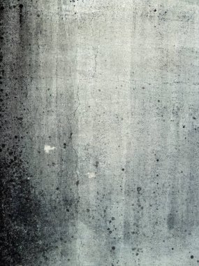 Soyut grunge gri arkaplan. Tasarım arka planı olarak kullanılabilecek zengin bir eski dokuya sahip bir duvar..
