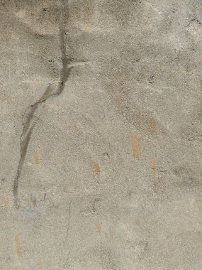 Soyut grunge gri arkaplan. Tasarım arka planı olarak kullanılabilecek zengin bir eski dokuya sahip bir duvar..