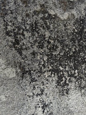 Soyut grunge gri arkaplan. Tasarım arka planı olarak kullanılabilecek zengin bir eski dokuya sahip bir duvar..