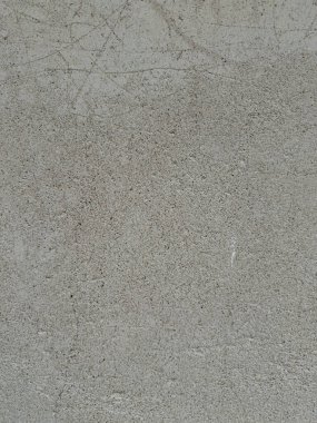 Soyut grunge gri arkaplan. Tasarım arka planı olarak kullanılabilecek zengin bir eski dokuya sahip bir duvar..