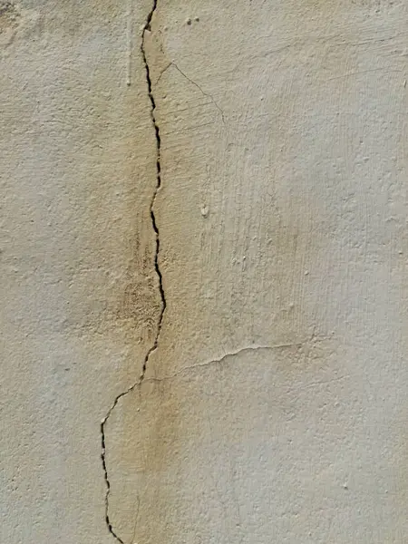 Soyut grunge gri arkaplan. Tasarım arka planı olarak kullanılabilecek zengin bir eski dokuya sahip bir duvar..