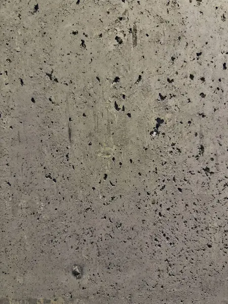 Taş dokusu arkaplanı kapat. Doğal Işık Duvarlarındaki Dokular ve Gölgeler.