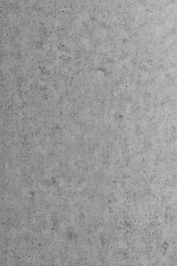 Doğal ışıkla aydınlatılan doğal gölgeli dokulu bir duvar..