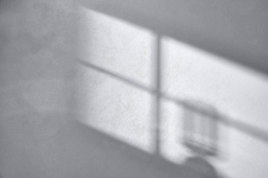 Somut desen arkaplanı. Pencereden süzülen doğal ışığın gölgeleri..