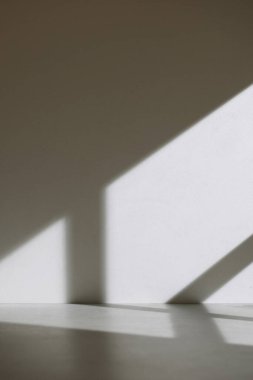 Somut desen arkaplanı. Pencereden süzülen doğal ışığın gölgeleri..