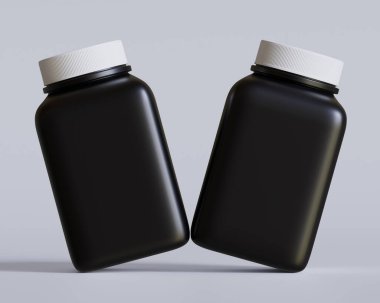 Kare hap şişesi siyah renk ve gri arka planda beyaz başlık