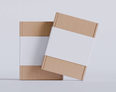 Gri arkaplanda beyaz etiketli kahverengi karton kutular