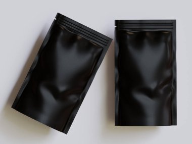 Gri arka planda siyah çanta modeli.