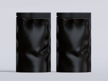 Gri arka planda siyah çanta modeli.