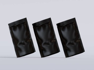 Gri arka planda siyah çanta modeli.