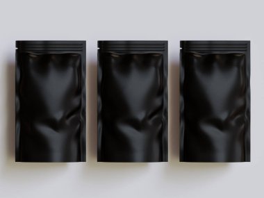 Gri arka planda siyah çanta modeli.