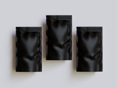 Gri arka planda siyah çanta modeli.