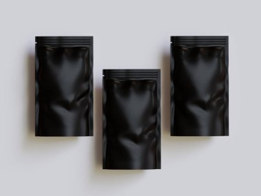 Gri arka planda siyah çanta modeli.