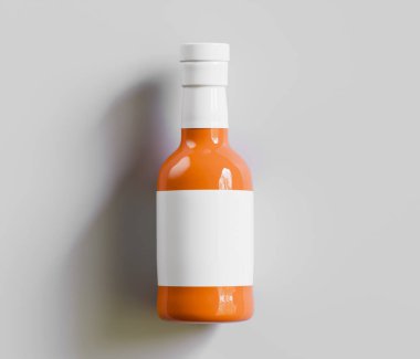 Gri arkaplanda boş etiketli sos şişesi