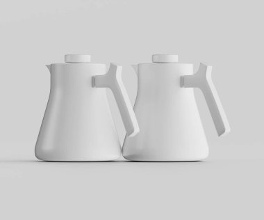 Minimalist tarzda iki beyaz seramik çaydanlık, nötr gri bir yüzeyde yan yana oturur. Işıklandırma parlak ve pürüzsüz yüzeyleri ve temiz tasarımı vurguluyor. Görüntü modern mutfak gereçleri ya da profesyoneller için ideal.