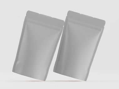 İki açık gri, esnek kese, muhtemelen yiyecek veya içecek için, tarafsız bir arkaplanda yüzüyor. Keselerin pürüzsüz, parlak bir yüzeyi var. Basit ve temiz bir tasarım görülebilir. Genel, stüdyo çekimi keseleri vurgular ve p için uygundur