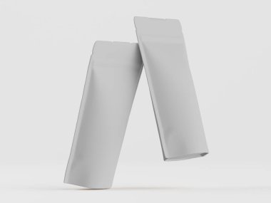 Basit, nötr bir arkaplan karşısında, muhtemelen ambalaj için iki adet açık gri esnek kese sunuluyor. Açılıdırlar ve havada süzülüyor ya da havada süzülüyor gibi görünürler, temiz ve modern bir tarz yaratırlar. Aydınlatma düzgün ve parlak, hars olmadan.