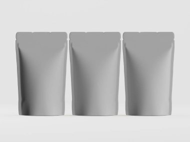 Görünüşte boş olan üç gri kese düz, açık gri bir arkaplanda yatay bir sıraya dizilmiştir. Keseler bir ürünü saklamak ya da paketlemek için tasarlanmış gibi görünüyor. Aydınlatma eşit ve kompozisyon basit, izleyicilerin...