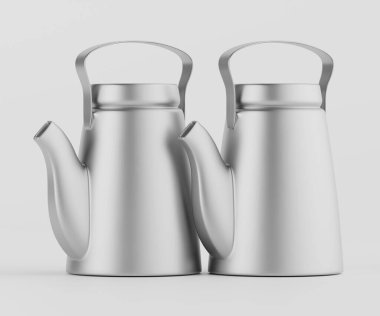 Açık gri arkaplanda yan yana duran iki küçük, gümüş çaydanlık. Tencerelerin basit, ince bir şekli ve pürüzsüz yansıtıcı yüzeyleri var. Yukarıdan aydınlatılıyor, gösterişli tasarımlarını sergiliyorlar. Görüntü kip hakkında sunumlar için idealdir