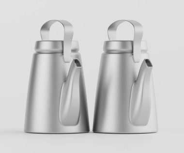 Açık gri arka planda iki küçük, şık, gümüş çaydanlık gösteriliyor. Tencereler geometrik olarak kulplar ve çıkıntılarla dizayn edilmiş. Basit, modern tasarım çağdaş bir estetiği akla getiriyor. Görüntü çevrimiçi bir katalogda kullanmak için uygundur