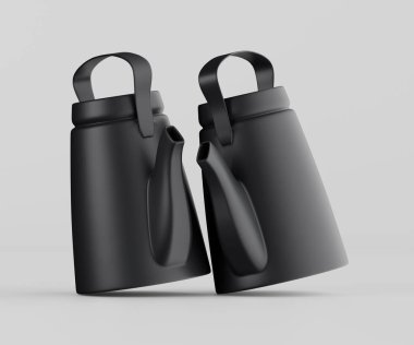 İki modern siyah çaydanlık bir stüdyo çekiminde gösteriliyor. Çaydanlıkların basit sapları ve hafif inceltilmiş şekli olan gösterişli, çağdaş bir tasarımı var. Aydınlatma parlak ve hatta tasarımın tüm detaylarını gösteriyor. Tarafsız arka plan.