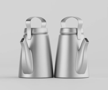 Bir stüdyo ortamında iki modern, açık gri metal çaydanlık gösteriliyor. İnce bir şekilleri, basit sapları ve çıkıntıları var. Görüntü iyi aydınlatılmış, metalin pürüzsüz dokusunu gösteriyor. Yemek pişirme ekipmanı veya ho reklamlarında kullanmak için ideal.