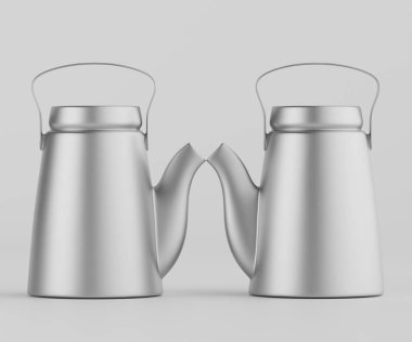 İki modern gümüş çaydanlık, tarafsız bir arkaplana karşı bir stüdyo çekimi. Çaydanlıklar pürüzsüz ve incedir, kulpları ve ağızları vardır. Aydınlatma düz ve parlak, pürüzsüz yüzeyleri ve yansıtıcı metali vurguluyor. Sahne onun için tasarlandı.