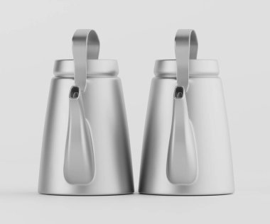 Tarafsız bir arkaplana karşı yan yana iki açık gri kahve kabı sergilenir. Tencerelerin ince bir şekli, uzun sapları ve çıkıntıları var. Aydınlatma eşit ve görüntünün bir stüdyo tarzı var. Reklam ve düzenleme için uygun