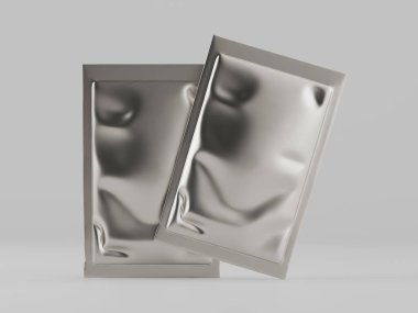 Bir stüdyo ortamında iki metalik gümüş kese gösteriliyor. Keselilerin buruşuk, dokulu bir yüzeyi var ve tarafsız bir zemin üzerinde sunuluyorlar. Işıklandırma, ambalaj tasarımı, reklam veya e için profesyonel bir estetik yaratıyor.