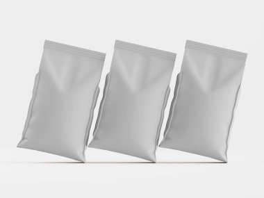 Açık gri, boş, yiyecek paketleme poşetleri bir ürün modelinde, açık gri arka planlı bir stüdyoda gösteriliyor. Çantalar hafif eğimli bir düzende gibi görünüyor. Görüntü iyi ışıklandırılmış ve ürün reklamı ve paketi için uygundur.