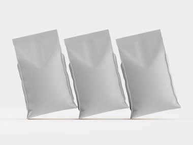 Açık gri, boş ambalaj çantaları açık gri bir arkaplanda açılı olarak gösteriliyor. Çantalar biraz çapraz bir düzende, gerçekçi bir sunum ya da maketi akla getiriyor. Aydınlatma eşit, belirgin bir gölge bırakmıyor. Çantalar...