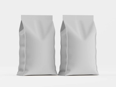 İki boş açık gri kağıt torbası düz beyaz arka plana karşı dik duruyor. Çantalar basit bir tasarıma sahip, ince bir kat çizgisi var. Işıklandırma eşit, temiz ve nötr bir sunum yaratıyor. Ürün çeşitli pazarlamalar için uygundur.