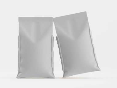 Düz beyaz arka planda iki açık gri kağıt torba sergileniyor. Poşetlerde basit bir tasarım var, görünür grafik ya da metin yok. Dik duruyorlar gibi görünüyor. Aydınlatma parlak ve eşit, temiz ve modern bir estetik oluşturuyor. T