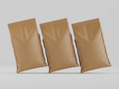 Açık gri bir yüzeyde üç tane Kraft kağıt torbası sergileniyor. Poşetler dolu görünüyor ve doğal kahverengi renkleri göze çarpıyor. Işıklandırma eşit ve nötr, ürün paketleme modelleri için uygun profesyonel bir görünüm yaratıyor. Görüntü...