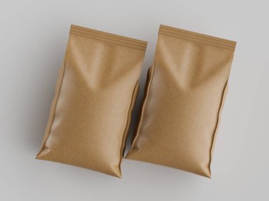 İki açık kahverengi yiyecek paketleme poşeti, tarafsız bir arkaplana karşı tepeden tırnağa perspektiften gösteriliyor. Çantaların parlak bir yüzeyi ve pürüzsüz bir dokusu var. Işıklandırma bile stüdyo ortamını işaret ediyor. Resim göstermek için uygundur