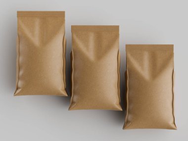 Üç açık kahverengi kese kağıdı, yukarıdan bakıldığında tarafsız gri bir arkaplanda sıralanır. Çantaların pürüzsüz, hafif parlak bir yüzeyi var. Poşetler boş görünüyor, ambalaj tasarımlarını sergiliyorlar. Görüntü temiz ve profesyonel bir ahır.