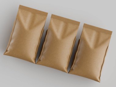 Açık kahverengi, dikdörtgen yiyecek paketleri açık gri bir yüzey üzerinde yatay olarak düzenlenir. Paketler pürüzsüz ve parlak bir malzemeden yapılmış gibi görünüyor. Işıklandırma düz ve genel, ambalajın dokusunu vurguluyor. Görüntü tanımlı