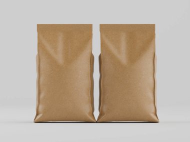 Açık kahverengi iki kese kağıdı, açık gri arka planda gösteriliyor. Torbaların boyutları ve şekilleri birbirine benziyor, pürüzsüz bir dokusu var. Yan yana dizilip simetrik bir kompozisyon oluşturuyorlar. Işıklar eşit ve nötrdür.