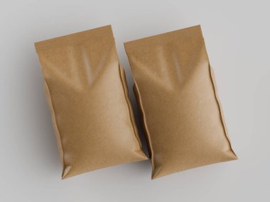 Tarafsız bir arkaplanda, kahve veya diğer yiyecek maddeleri için olması muhtemel iki açık kahverengi kese kağıdı sergileniyor. Poşetler pürüzsüz ve hafif parlak görünüyor, temiz bir tasarım sergiliyor. Tepedeki ışıklandırma dengeli bir ton sağlıyor, modern bir görünüm yaratıyor..  