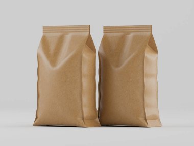 İki açık kahverengi kese kağıdı açık gri arka plana karşı dik duruyor. Poşetlerde pürüzsüz, biraz buruşuk bir doku var. Çantalar stil ve boyut olarak benzer, basit ve modern bir ambalaj tasarımı sergiliyorlar. Görüntü iyi aydınlatılmış ve uygun.