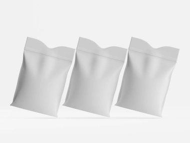 Stüdyo ortamında üç boş, açık gri plastik torba gösteriliyor. Çantaların boyutları ve şekilleri birbirine benziyor. Çantalar hafif çapraz konumda ve hareket hissi uyandırıyor. Işıklandırma eşit ve yüzeyleri ve fol vurguluyor