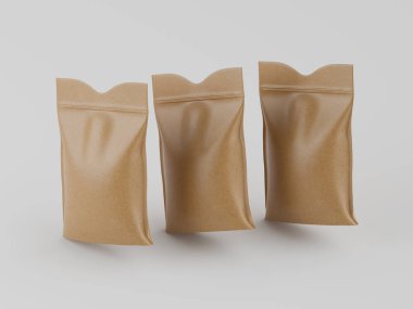 Tarafsız, açık renkli bir arkaplana karşı üç kahverengi, dikey keseler sunuluyor. Kese pürüzsüz, mat bir doku sergiliyor ve her biri üst kısmında fermuar kapağı ile mühürlenmiş. Kompozisyonda ışıklandırma bile var.