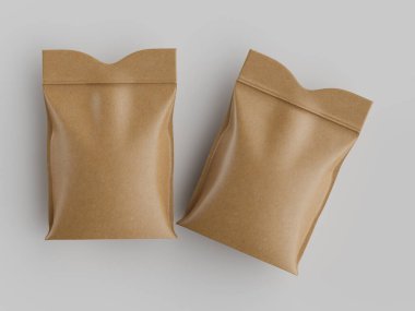 Atıştırmalıklar ya da diğer besin maddeleri için açık bej renkli iki poşet, yüksek açılı ve tepeden görülebiliyor. Poşetler pürüzsüz ve hafif kıvrımlı ya da buruşuk bir dokusu var. Çantalar yatay pozisyonda, küçük bir miktar...