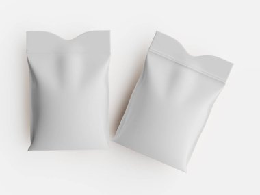 Bu resimde düz beyaz bir arkaplan karşısında iki boş, jenerik kese var. Keseler, sessiz ve nötr bir tonda yapılmış. Yumuşak bir doku gösteriyor. Esnek bir materyal olduğunu gösteriyor. Kompozisyon yumuşak ışıklandırmalı genel bir perspektif içeriyor