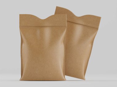 Tarafsız bir arkaplanda, stüdyo tarzı bir düzende sunulmuş iki kahverengi kağıt kese duruyor. Kese, maket tarzında, yumuşak, sessiz bir renk paleti sergiliyor. Işıklandırma ambalaj malzemesinin ince dokusunu vurguluyor. Bu resim s