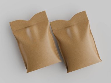 İki açık kahverengimsi, esnek, dikdörtgen ambalaj torbası yukarıdan görülmektedir. Çantalar pürüzsüz ve parlak bir maddeden yapılmış gibi görünüyor. Onlar nötr açık gri bir dalganın üzerinde hafifçe sersemlemiş bir şekilde konumlandırılmışlardır.