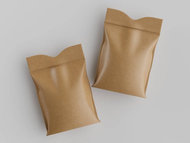 İki mühürlü kese kağıdı düz beyaz bir yüzeyde duruyor. Çantaların bronz veya kahverengi renkleri var ve yumuşak, dağınık ışıklandırmayla kaplanmış, bu da stüdyo ortamını gösteriyor. Kompozisyon genel bir perspektiften, çantalar hafif açılı çekici ile