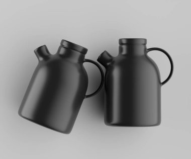 Modern minimalist bir tasarıma sahip gösterişli, mat siyah bir seramik sürahi. Yumuşak kıvrımlı silindirik bir gövdesi, sağlam bir sapı ve kendine özgü açılı bir çıkıntısı vardır.