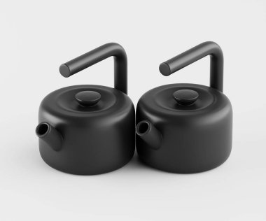 İki özdeş, mat siyah çaydanlık bir stüdyo ortamında açık gri arka plana karşı sunuluyor. Çaydanlıklar pürüzsüz bir yüzeyi ve basit, kıvrımlı sapları olan yuvarlaktır. Işık pürüzsüz ve yumuşaktır. Kettl 'ın şeklini ve dokusunu vurgular.