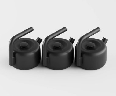 Üç özdeş küçük siyah çaydanlık yatay sırada dizilir. Çaydanlıklar siyah renktedir ve düz kavisli sade yuvarlak şekillere sahiptir. Yüzey parlak, görünür bir doku göstermiyor. Dekor stüdyo ya da kapalı.,